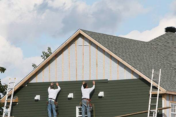 Professional Emergency Siding Repair technician working in Centereach, NY